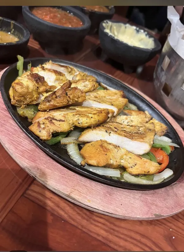 Before and after restaurant photography — phone camera fajitas photo, low quality restaurant image near Disney World, Central Florida 2026